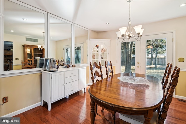 dining room with visible vents, plenty of natural light, french doors, and an inviting chandelier