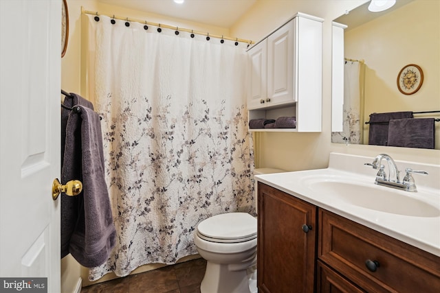 full bathroom featuring vanity, tile patterned floors, toilet, and a shower with shower curtain