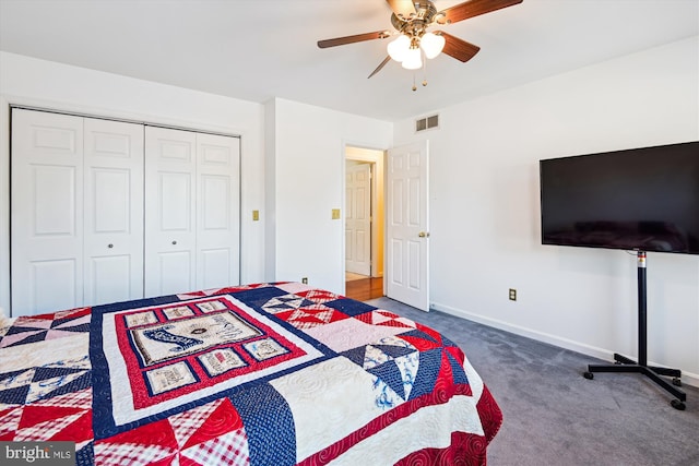 bedroom featuring visible vents, a ceiling fan, a closet, carpet, and baseboards