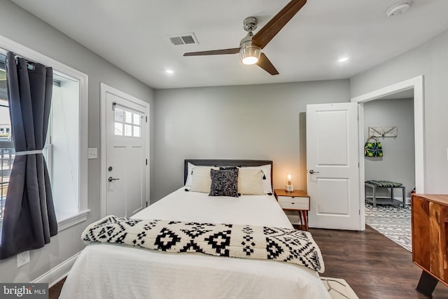 bedroom featuring dark wood-style floors, recessed lighting, visible vents, and a ceiling fan