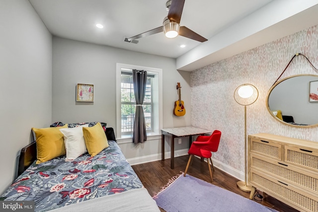 bedroom with baseboards, dark wood-type flooring, recessed lighting, and wallpapered walls