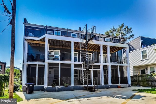 back of property featuring a patio