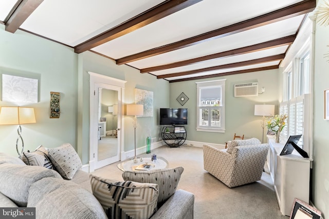 living room featuring light carpet, an AC wall unit, beamed ceiling, and a healthy amount of sunlight