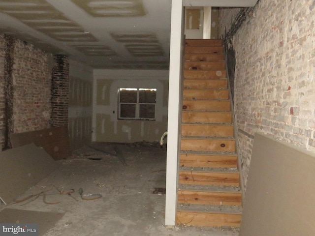 stairs with brick wall