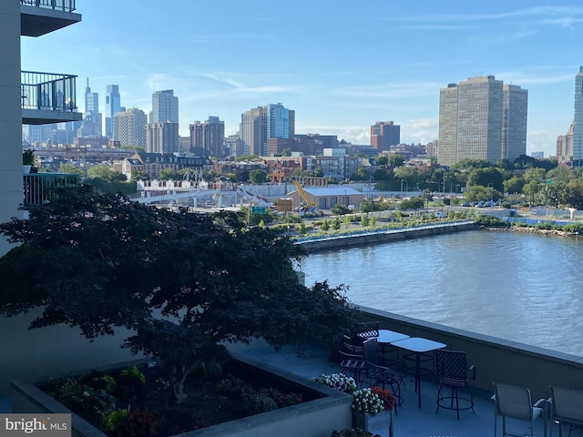 property's view of city with a water view