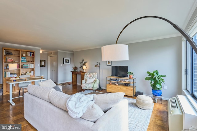 living area featuring baseboards, crown molding, and an AC wall unit