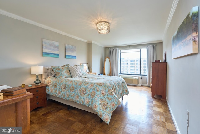 bedroom with ornamental molding, an AC wall unit, and baseboards