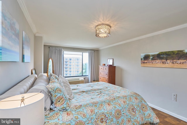 bedroom with ornamental molding and baseboards