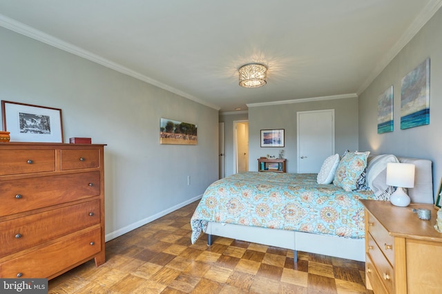 bedroom featuring ornamental molding and baseboards