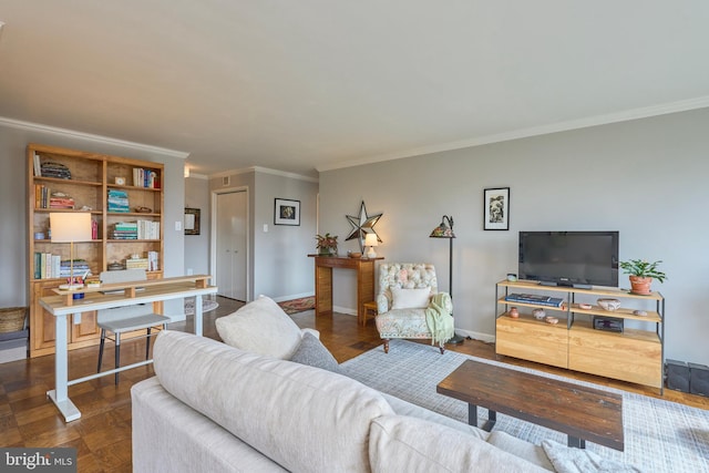 living room featuring ornamental molding and baseboards