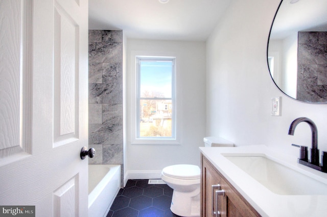 full bathroom with toilet, tile patterned flooring, baseboards, and vanity