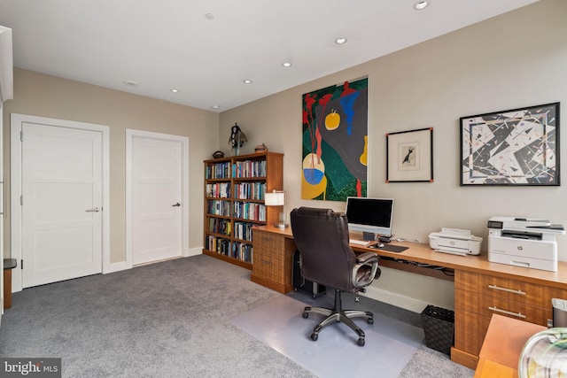 carpeted office space with baseboards and recessed lighting