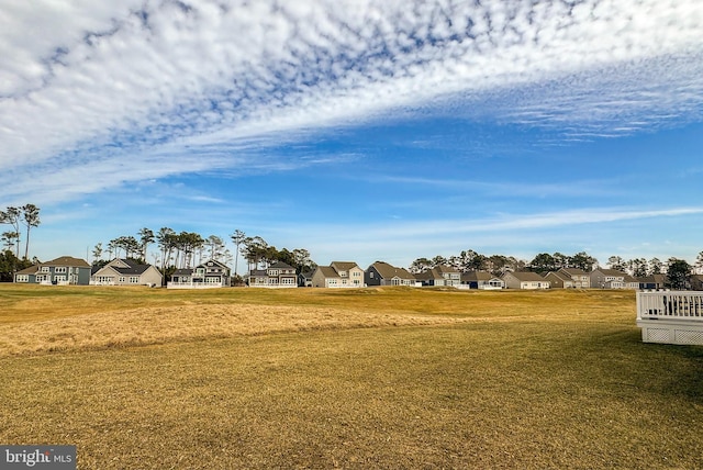 view of yard featuring a residential view