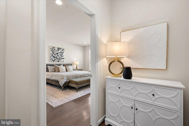 bedroom featuring wood finished floors