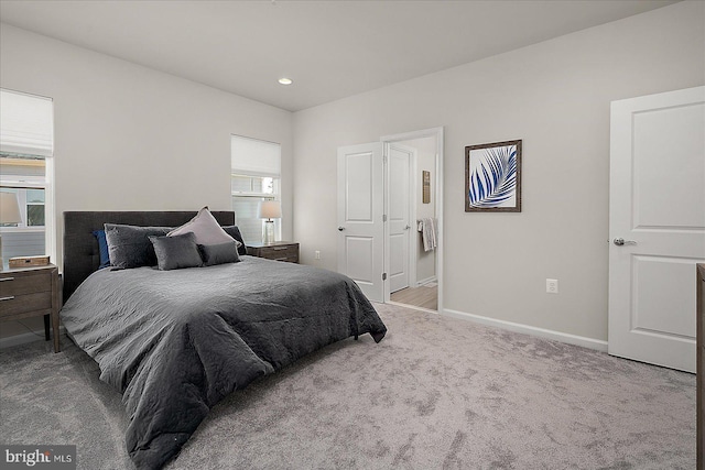 carpeted bedroom with recessed lighting and baseboards