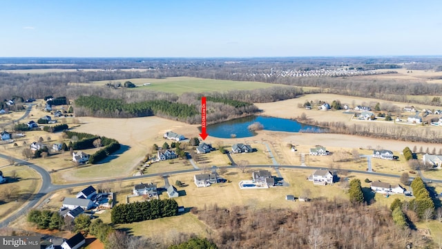 drone / aerial view with a water view and a rural view