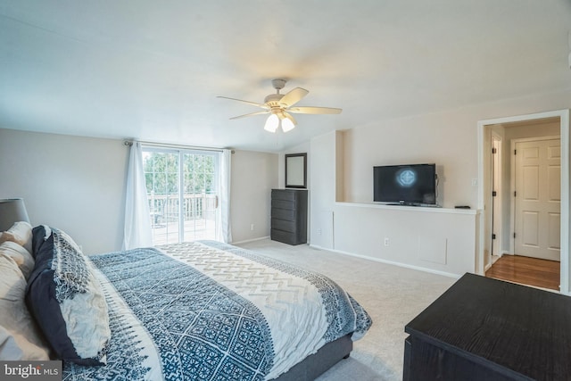 bedroom featuring baseboards, a ceiling fan, access to exterior, vaulted ceiling, and carpet floors