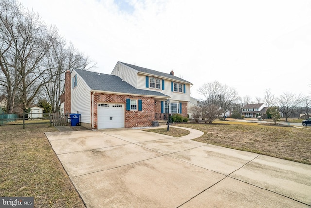 view of front of property featuring a garage, concrete driveway, brick siding, and a chimney