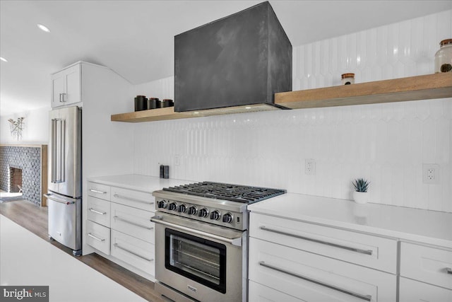 kitchen featuring white cabinetry, appliances with stainless steel finishes, open shelves, and light countertops