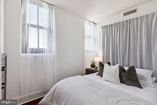 bedroom with visible vents