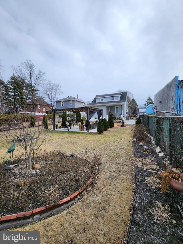 view of yard featuring a gazebo and fence