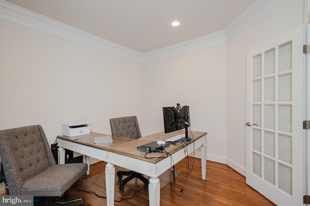 office space featuring crown molding, baseboards, wood finished floors, and recessed lighting