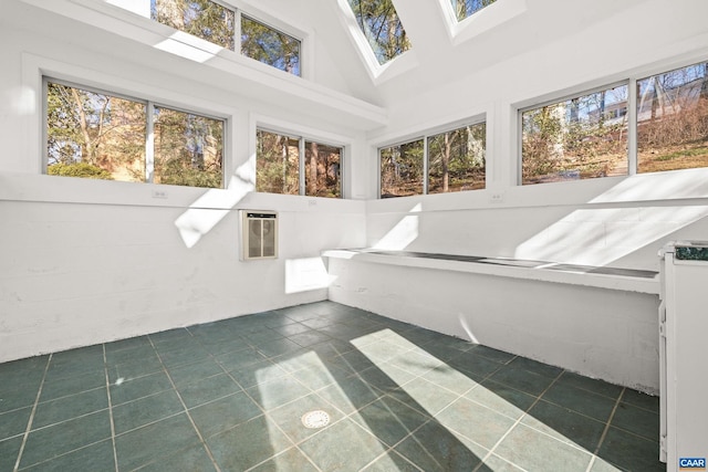 sunroom / solarium featuring a skylight