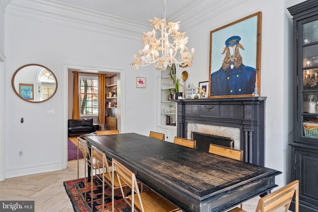 922 Clinton St, Philadelphia, PA 19107 - dining space with crown molding, a high end fireplace, a chandelier, and baseboards