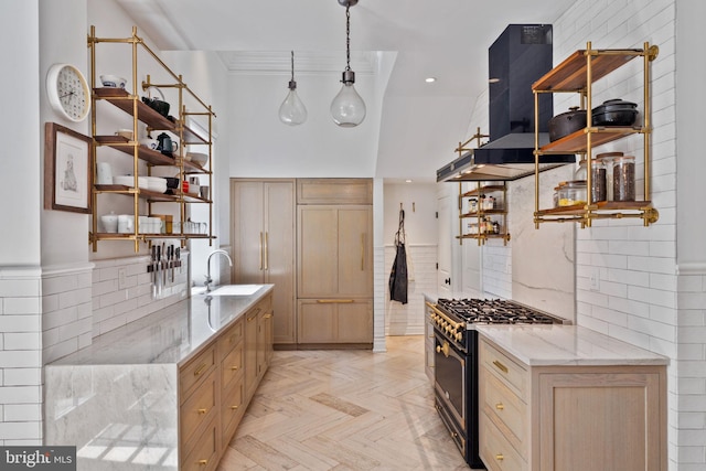 922 Clinton St, Philadelphia, PA 19107 - kitchen with range with gas stovetop, open shelves, exhaust hood, light stone countertops, and a sink
