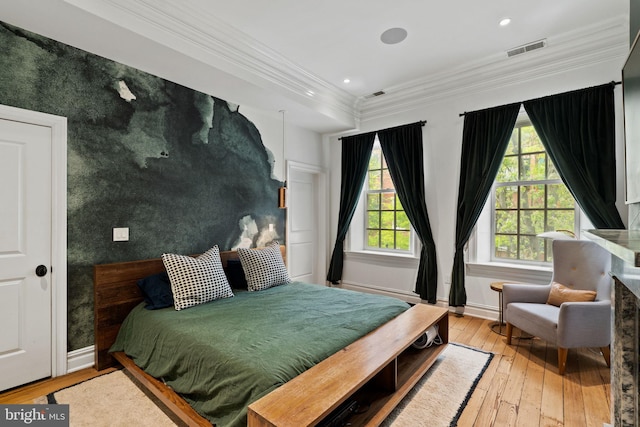 922 Clinton St, Philadelphia, PA 19107 - bedroom featuring an accent wall, hardwood / wood-style floors, baseboards, recessed lighting, and crown molding