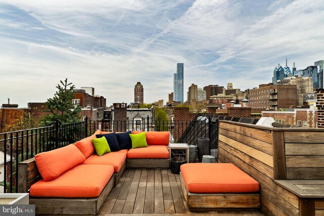 922 Clinton St, Philadelphia, PA 19107 - wooden deck with a view of skyline and outdoor lounge area