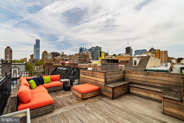 922 Clinton St, Philadelphia, PA 19107 - deck featuring a view of skyline and an outdoor hangout area