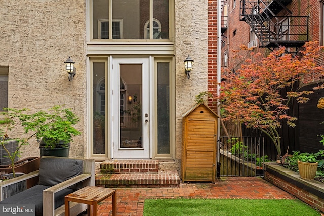 922 Clinton St, Philadelphia, PA 19107 - property entrance featuring stucco siding