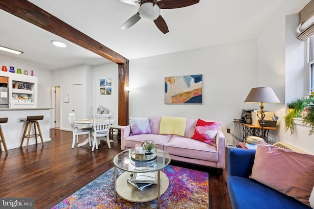 living room with ceiling fan, recessed lighting, beamed ceiling, and wood finished floors