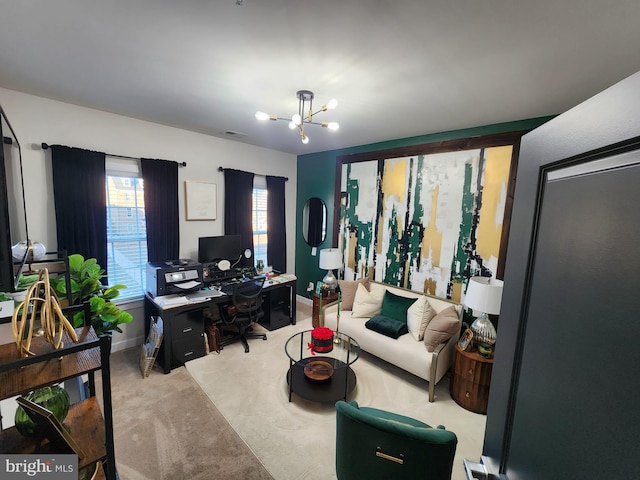 carpeted office with visible vents, baseboards, and an inviting chandelier