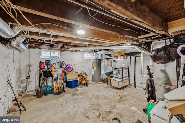 below grade area featuring water heater