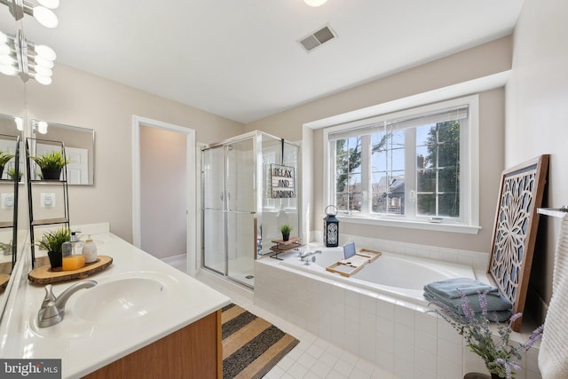 bathroom with a sink, visible vents, a shower stall, a bath, and tile patterned floors