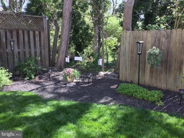 view of yard featuring fence