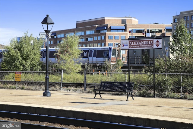 view of property's community featuring fence