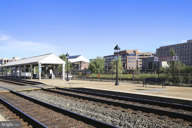 view of community featuring fence