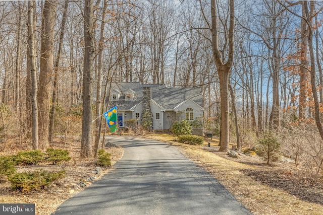 cape cod home with driveway