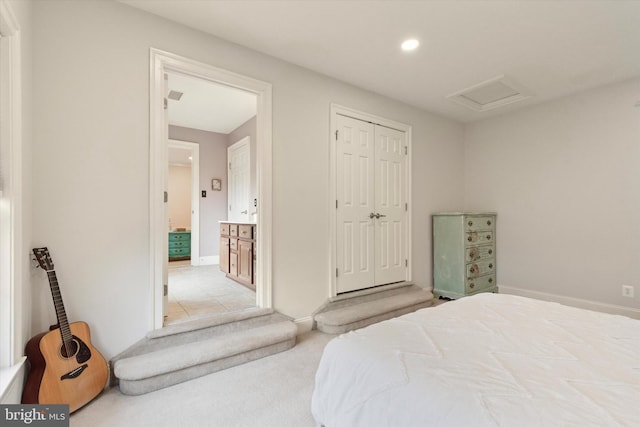 carpeted bedroom with attic access, baseboards, a closet, and recessed lighting