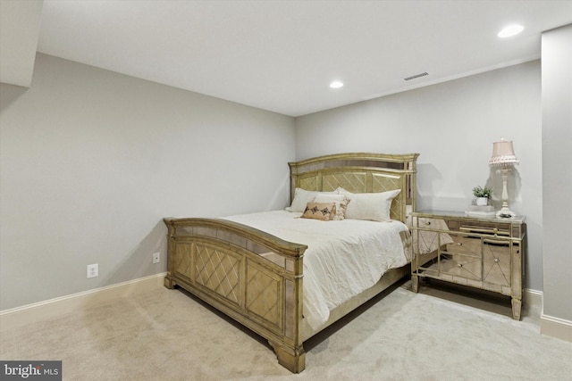 bedroom featuring carpet floors, recessed lighting, visible vents, and baseboards