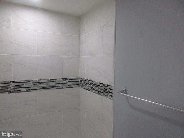 interior space with a tile shower