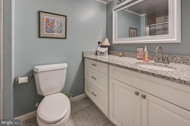 bathroom with tile patterned flooring, baseboards, toilet, an enclosed shower, and vanity