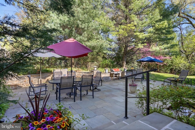 view of patio featuring outdoor dining space