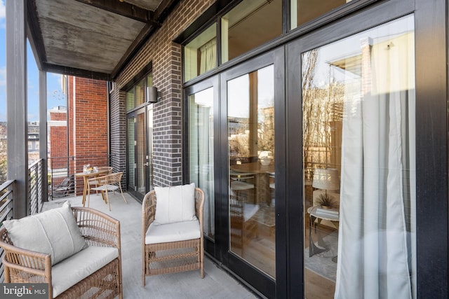 balcony featuring french doors