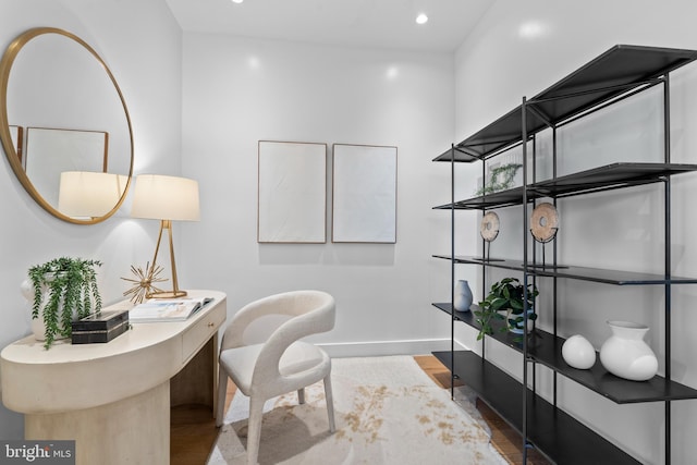 office area featuring recessed lighting, baseboards, and wood finished floors