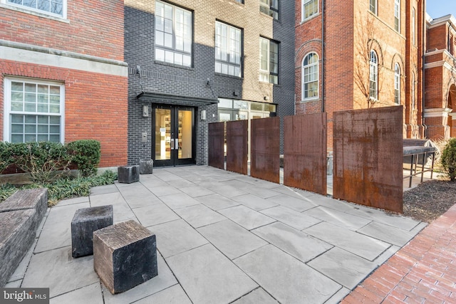 view of patio / terrace with french doors and fence