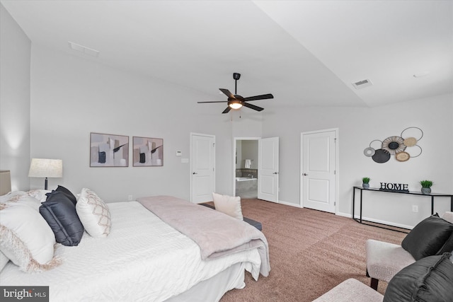 carpeted bedroom with lofted ceiling, visible vents, ensuite bathroom, a ceiling fan, and baseboards